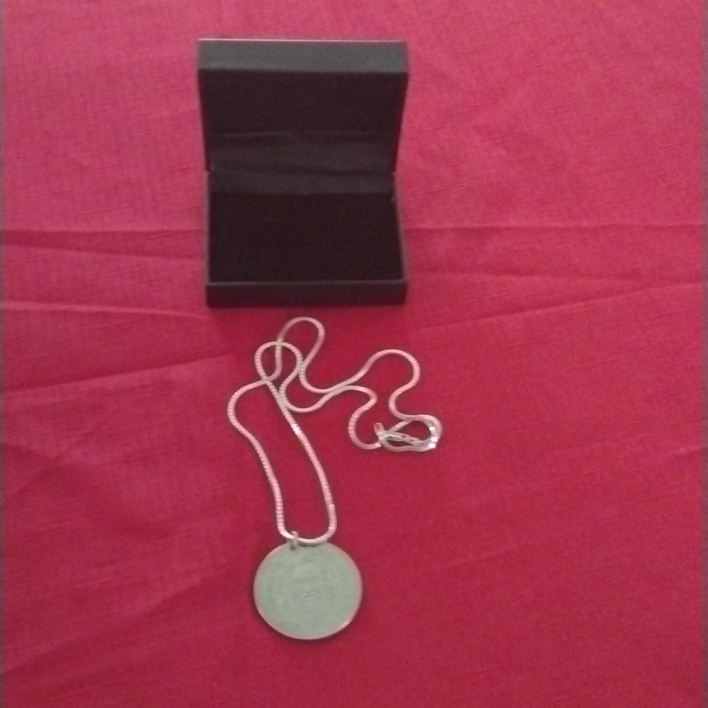 I am selling a vintage Caesars Palace magical empire necklace